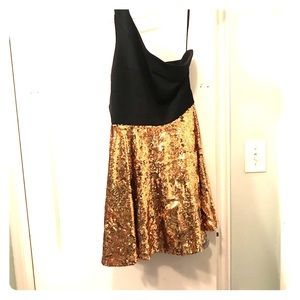 Black and gold sequin dress from ark and co